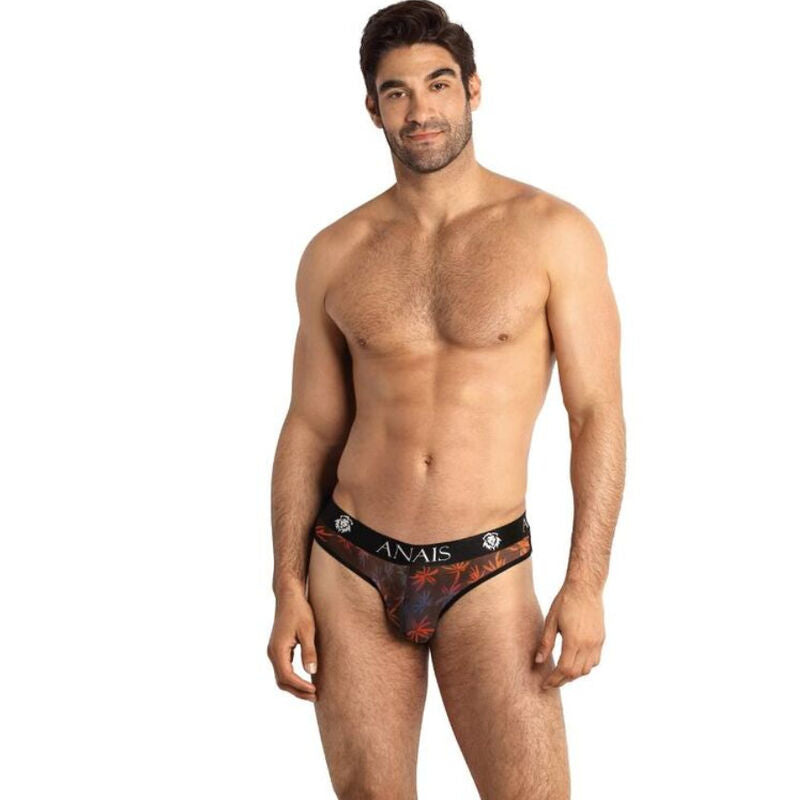 Homme de face portant le slip Chill taille XL d'Anais Men, tulle noir aux palmiers colorés