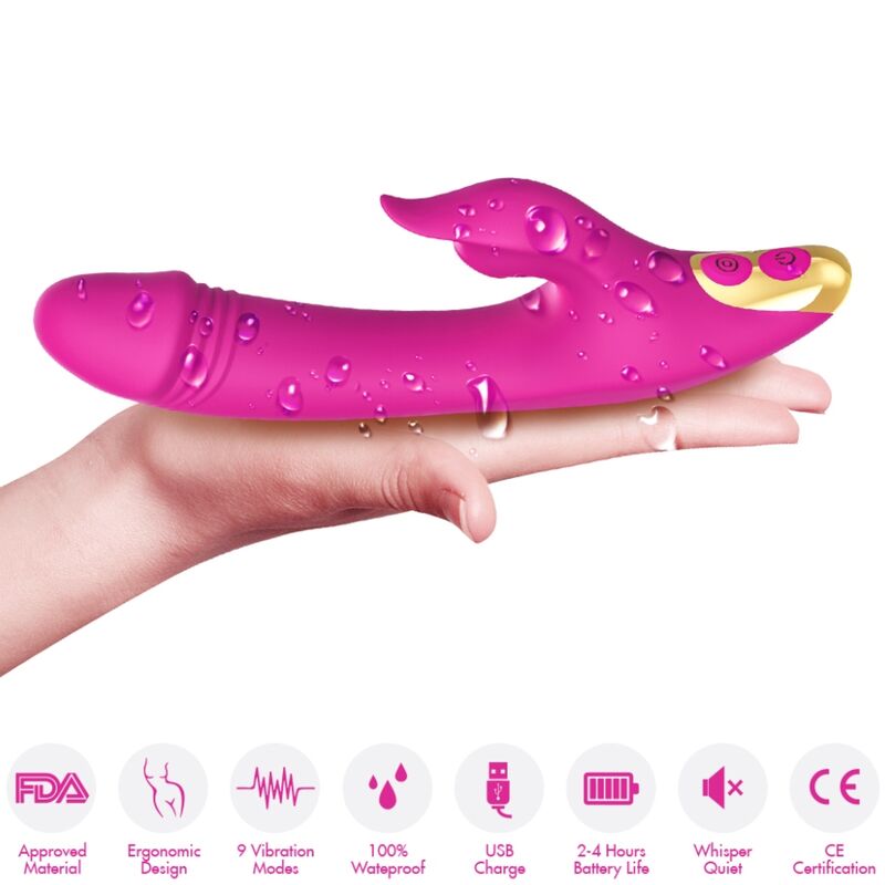 Main tenant le rabbit Love fuchsia d'Armony et pictogrammes des fonctions