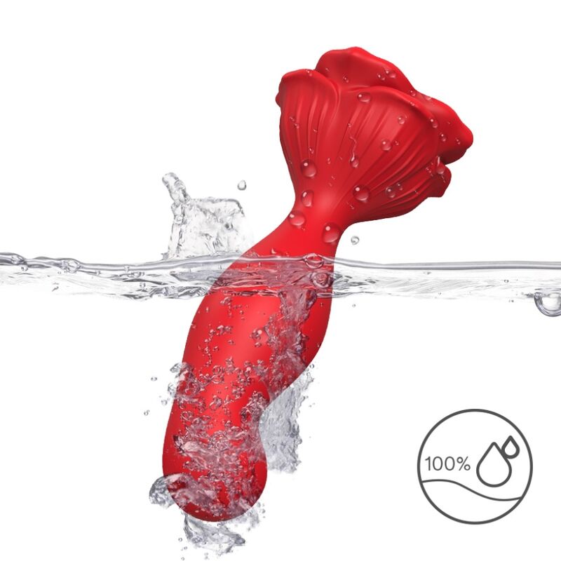 Plug anal vibrant rose Armony plongé dans l'eau, base en pétales vue de face