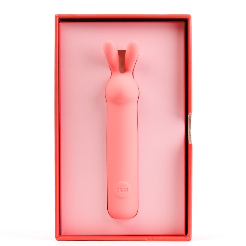 Bullet ILY Rabbit corail rangé dans sa boîte ouverte, calage rose